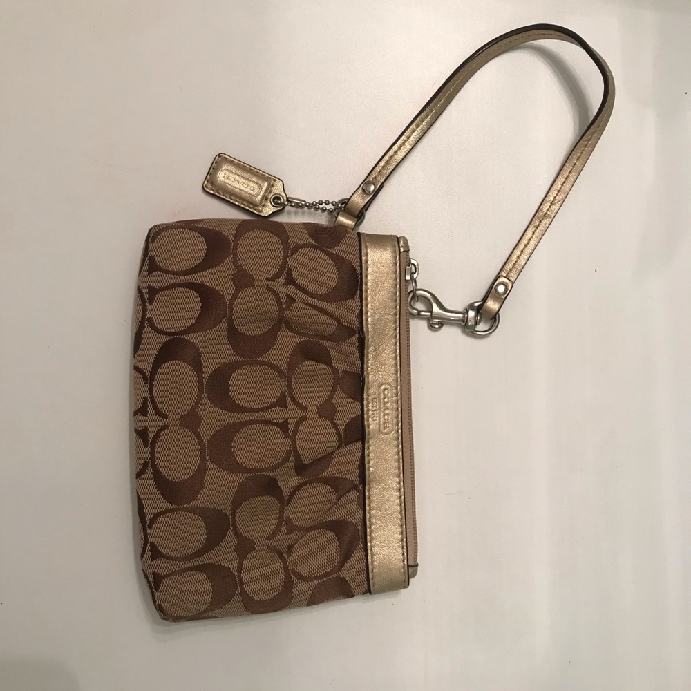 Coach wristlet with gold detail